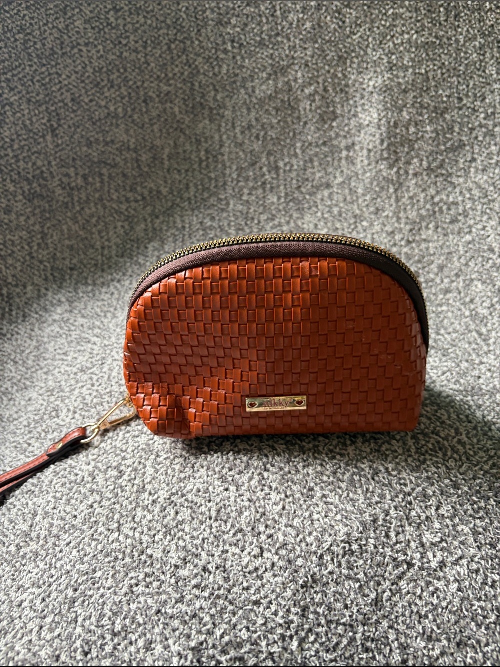 Nikky Woven Leather Wristlet Pouch - Brown from Nicole Lee.